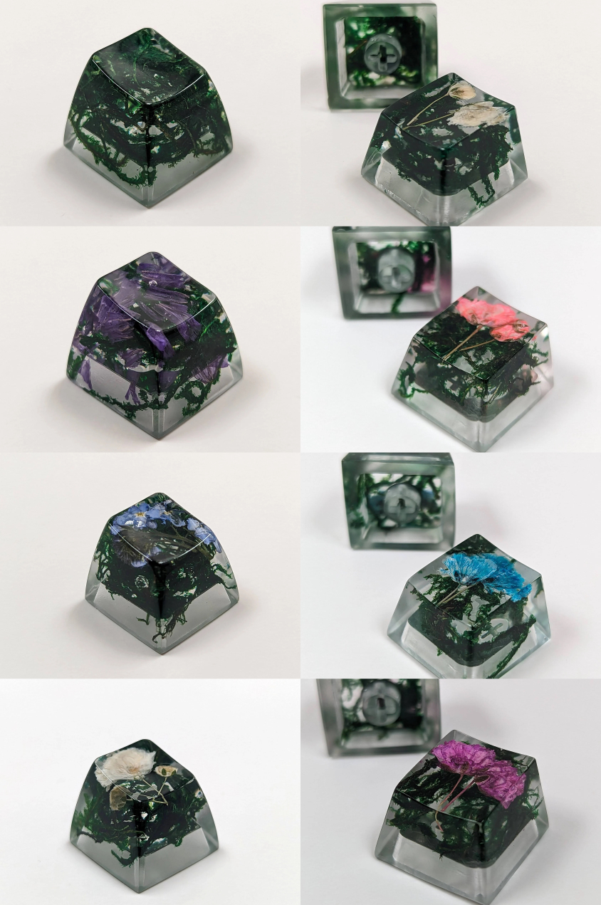 Resin keycaps including moss and flowers